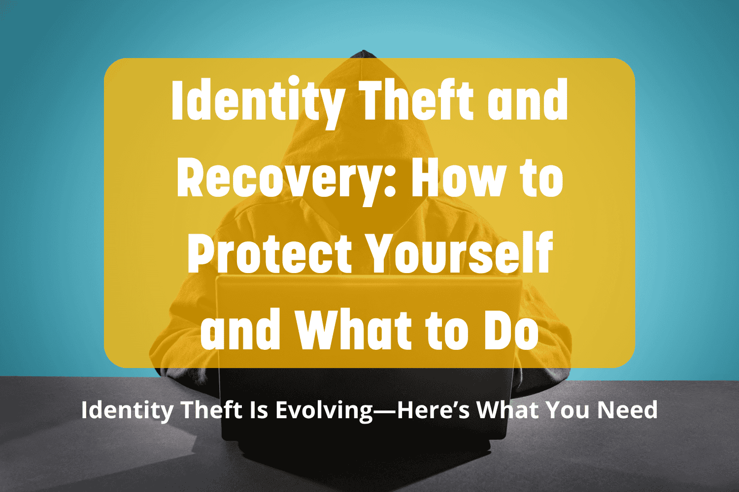 A hooded figure on a laptop in the shadows. Identity Theft Recovery